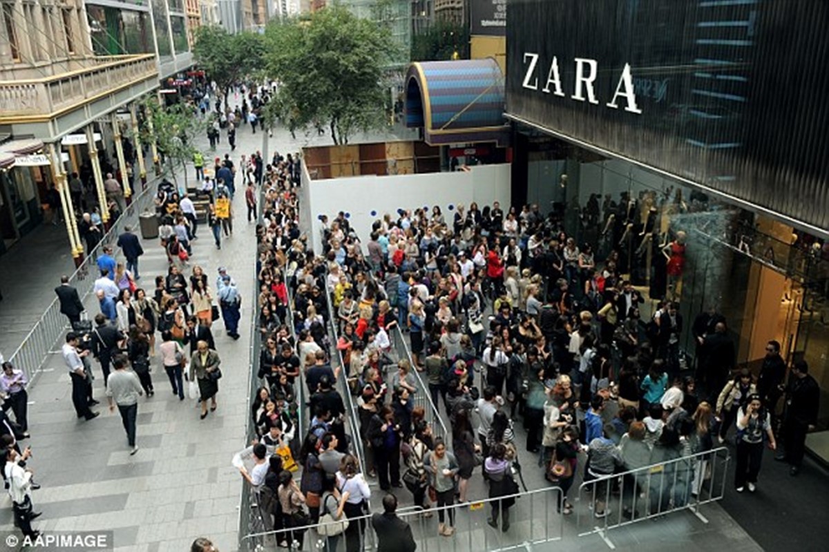 Zara customers waiting in front of its store